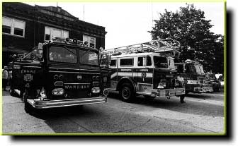 August 1996 - Wareham engine 4, Bridgewater ladder 1, and Carver engine 2 all cover Middleborough's central fire station during a fire at the T. F. Washburn company on Center Street in Middleborough.